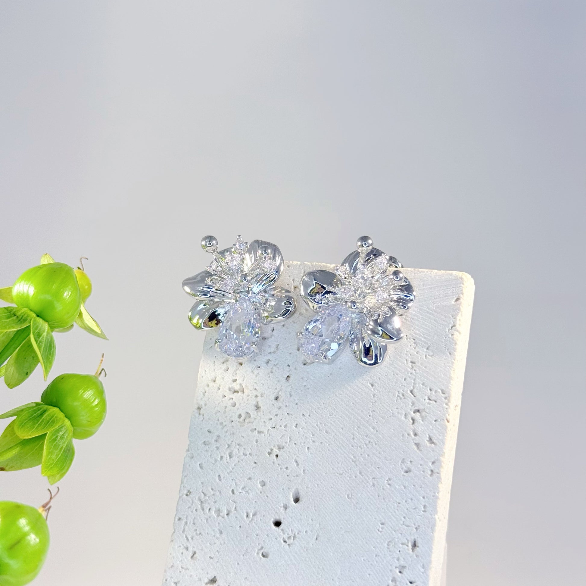 Silver flower stud earrings with sparkling gemstone center, summer nature jewelry