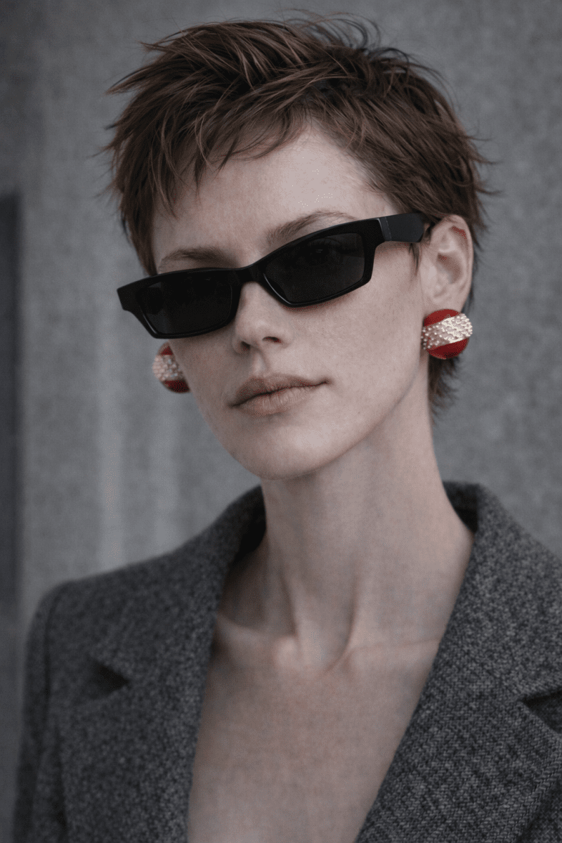 Model wearing  Red Ember studs minimalist elegant studs - Statement pop of color jewelry - The Avenue